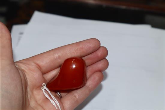 A yellow metal mounted natural amber pebble pendant, with GCS certificate dated 8/5/19.